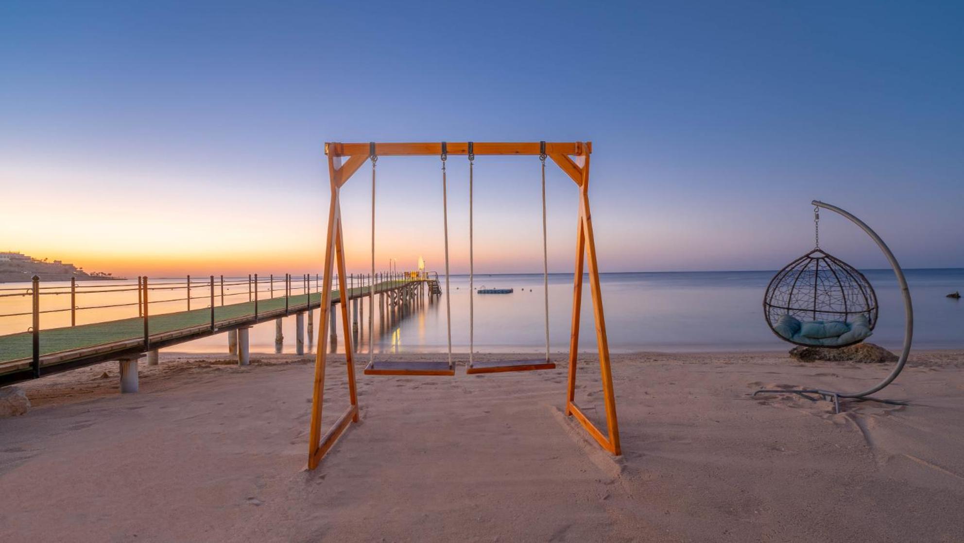 Park Regency Sharm El Sheikh Resort Exterior foto Sunset at the beach